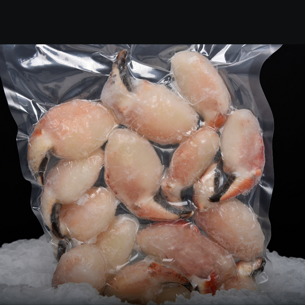 Pinzas de Jaiba selladas en bolsa sobre una cama de hielo