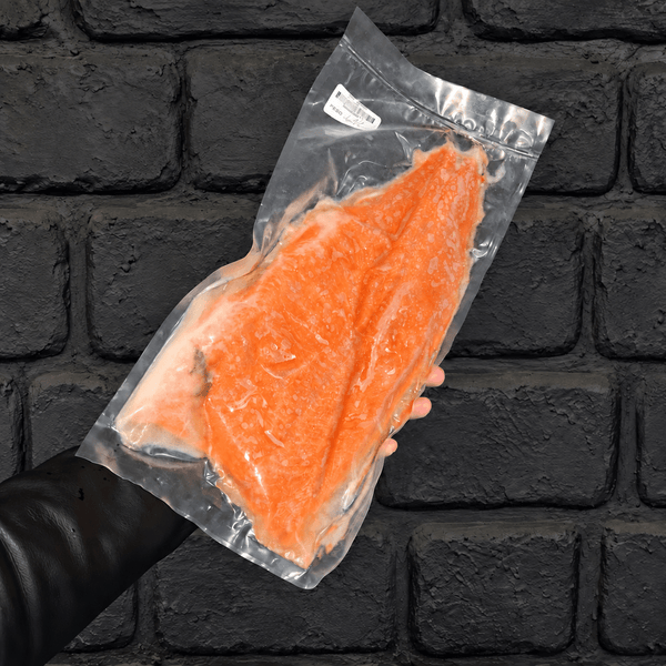 Filete de salmón coho con piel envasado al vacío